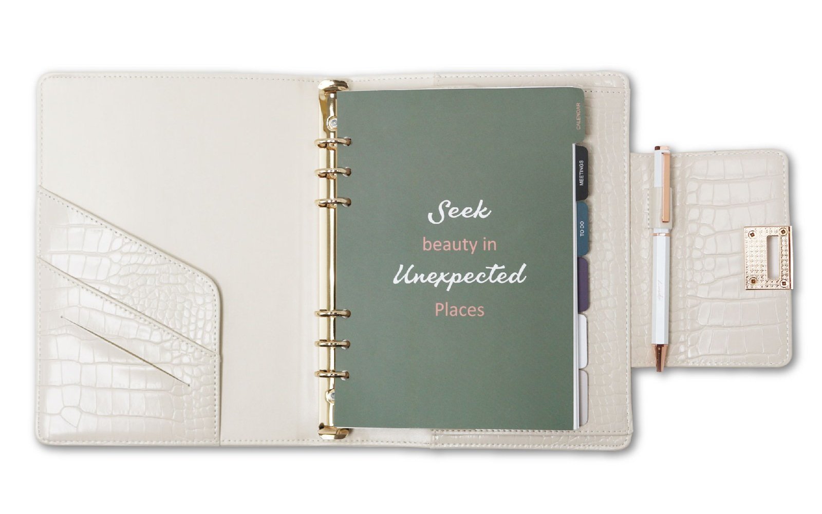 An EGOSUNNY planner open on a desk, showing refillable pages and card slots