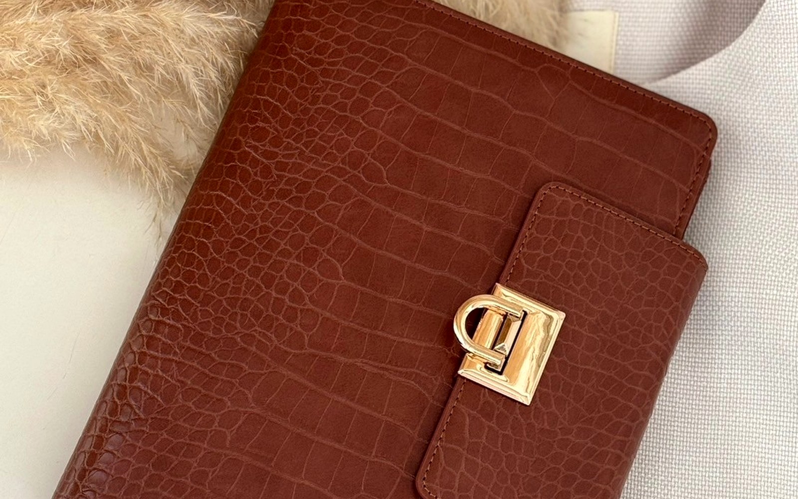 EGOSUNNY Croco planner styled on a calm desk beside a white blazer