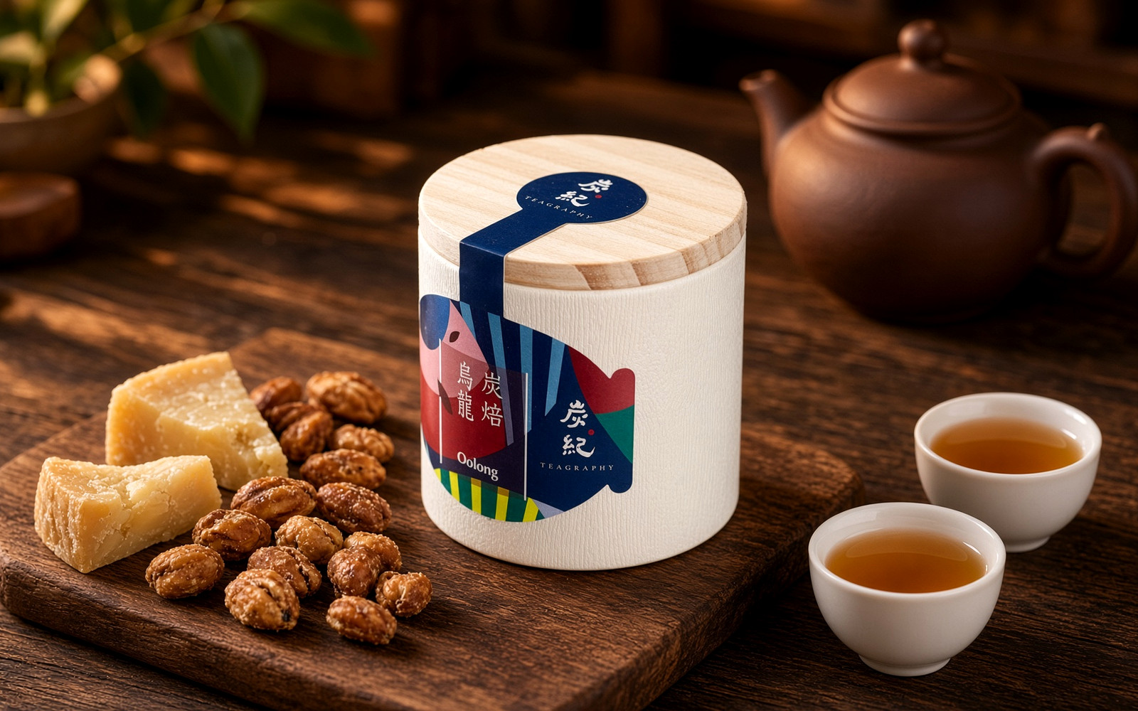 TEAGRAPHY charcoal-roasted Oolong can with roasted nuts, aged cheese and cups of amber tea