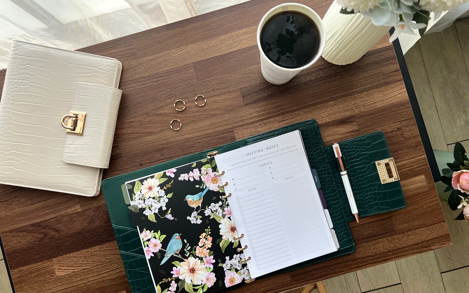 EGOSUNNY Croco planner open with floral pages on a desk