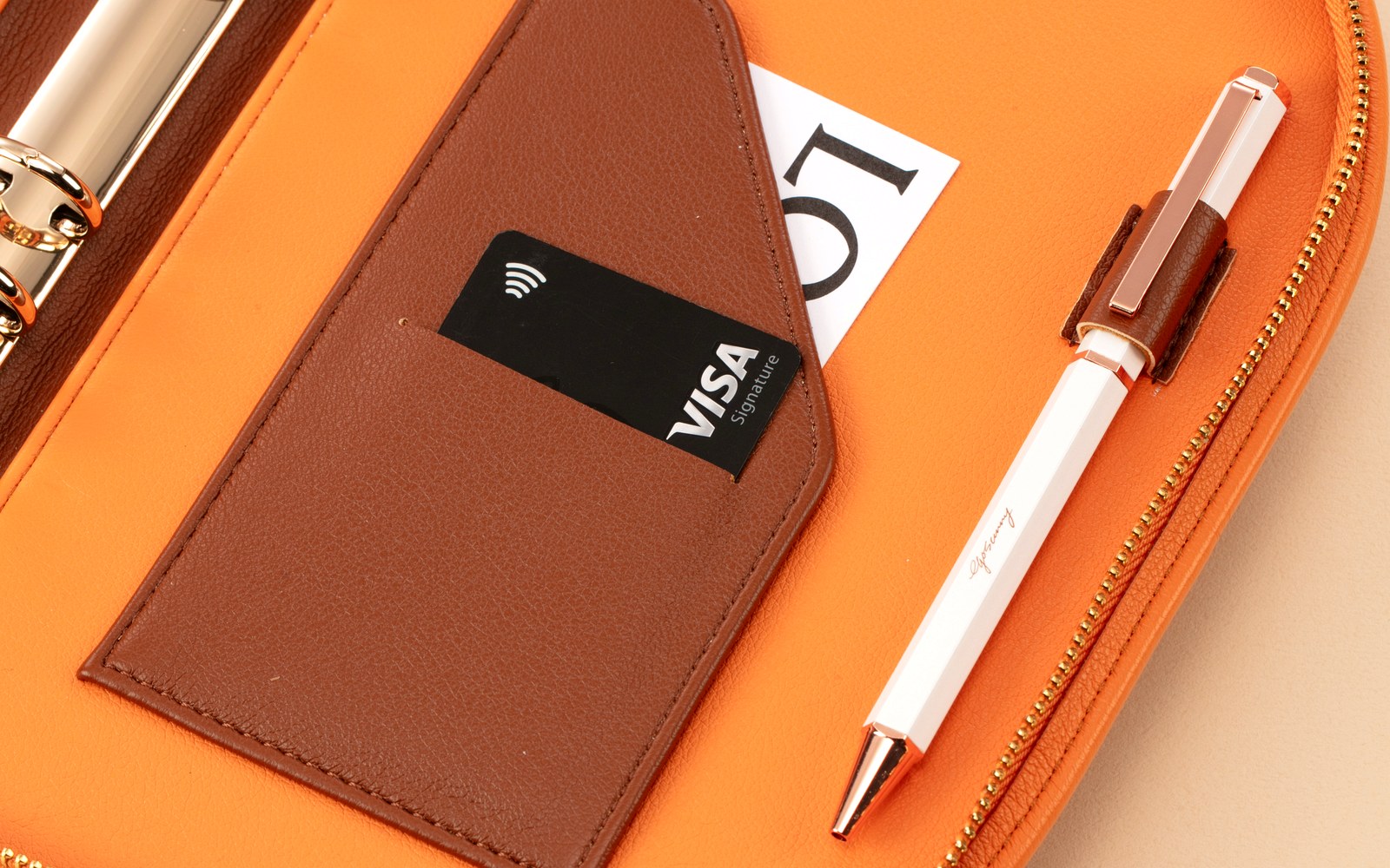Card slot and pen inside an open Luna planner