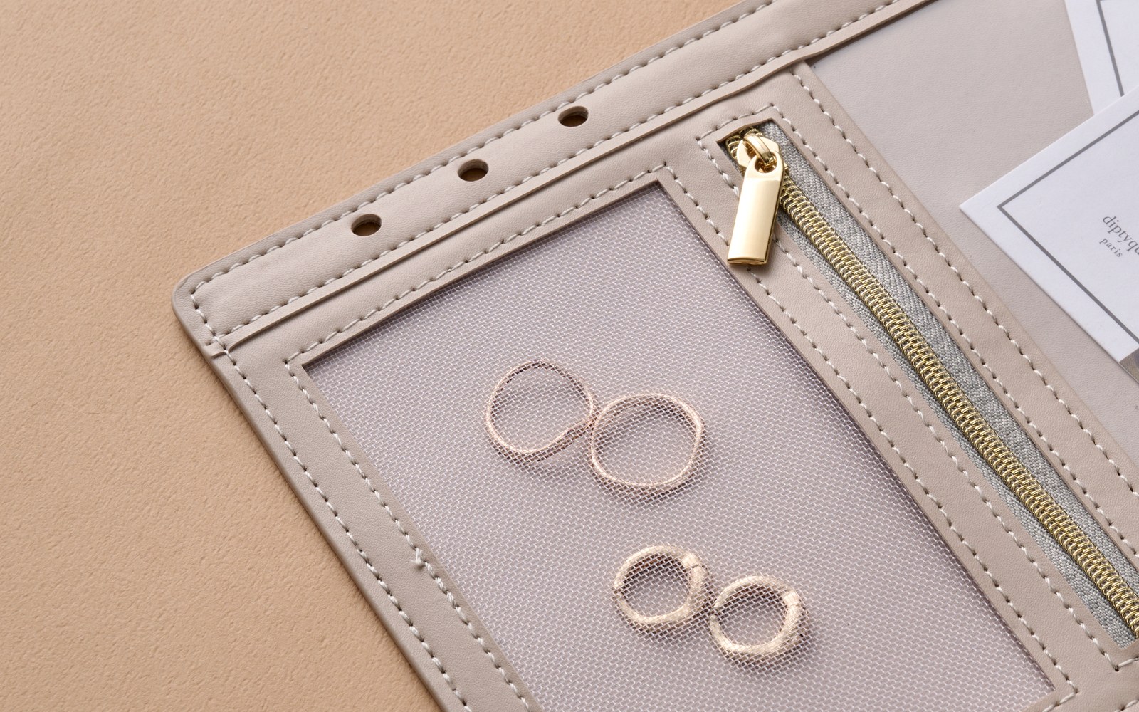 Zip pocket inside an EGOSUNNY Eclair planner holding small accessories