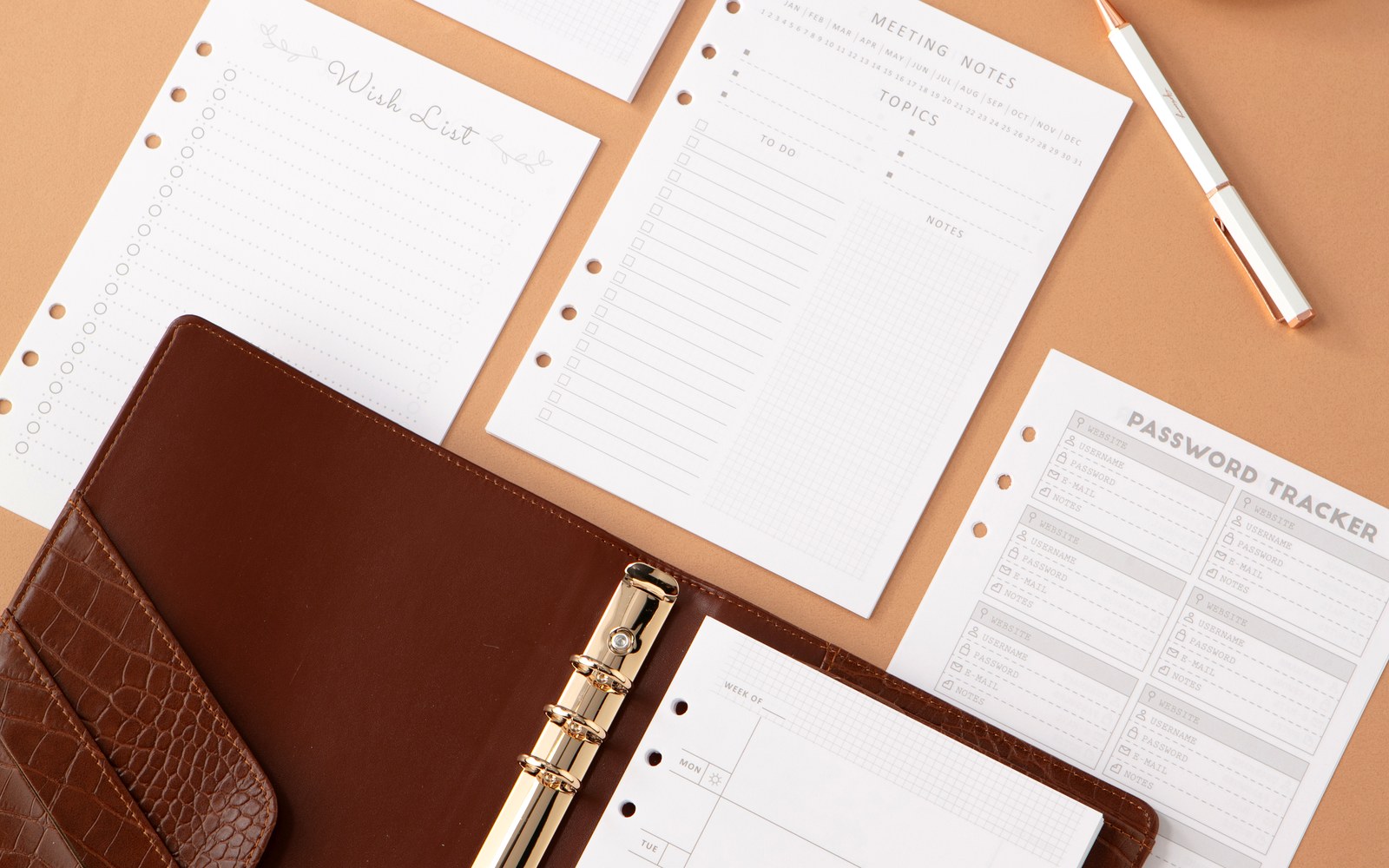 Brown EGOSUNNY Croco planner with planner pages spread beside it
