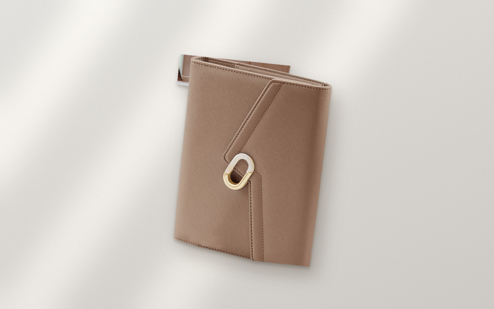 Taupe EGOSUNNY L’Éclair planner on a soft backdrop