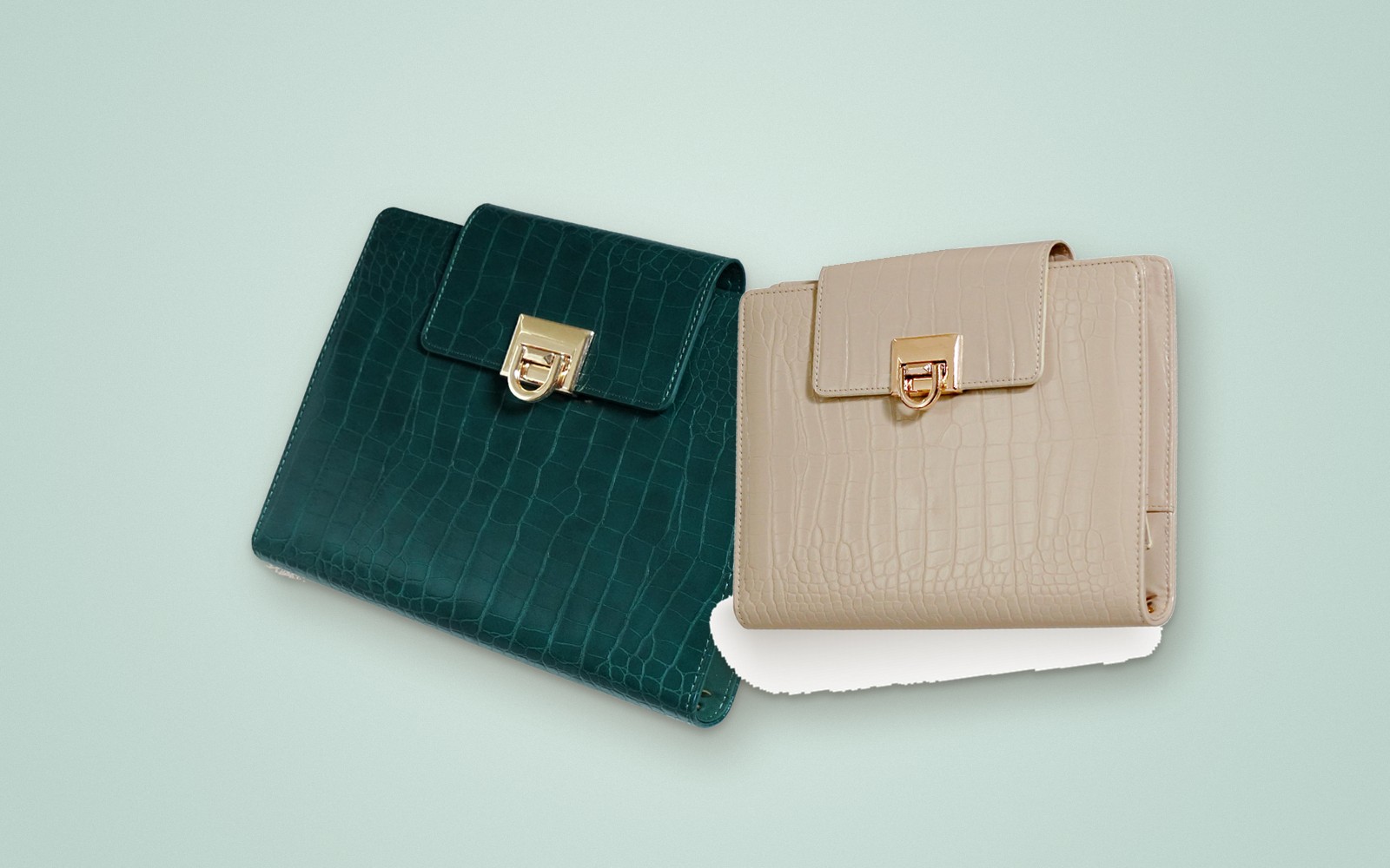 Green and beige EGOSUNNY Croco planners on a soft background