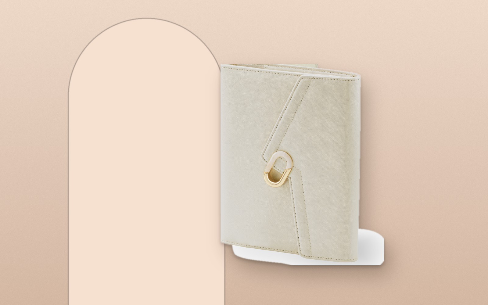 Cream EGOSUNNY L’Éclair planner on a terracotta arch background