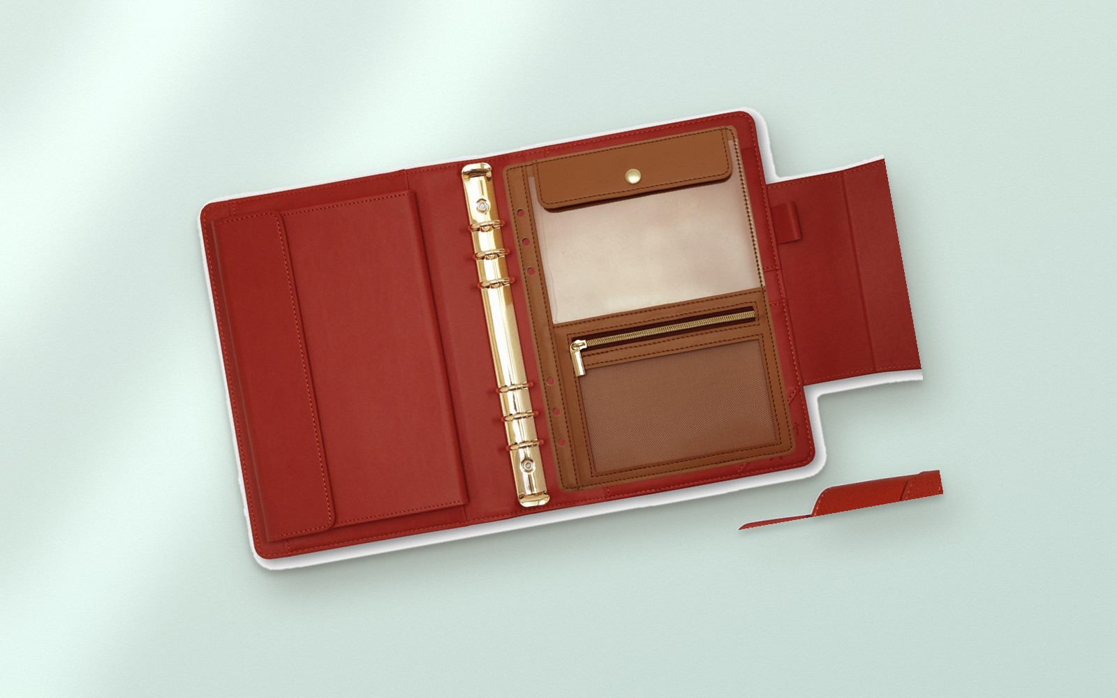 Open red EGOSUNNY Belt planner on a mint background