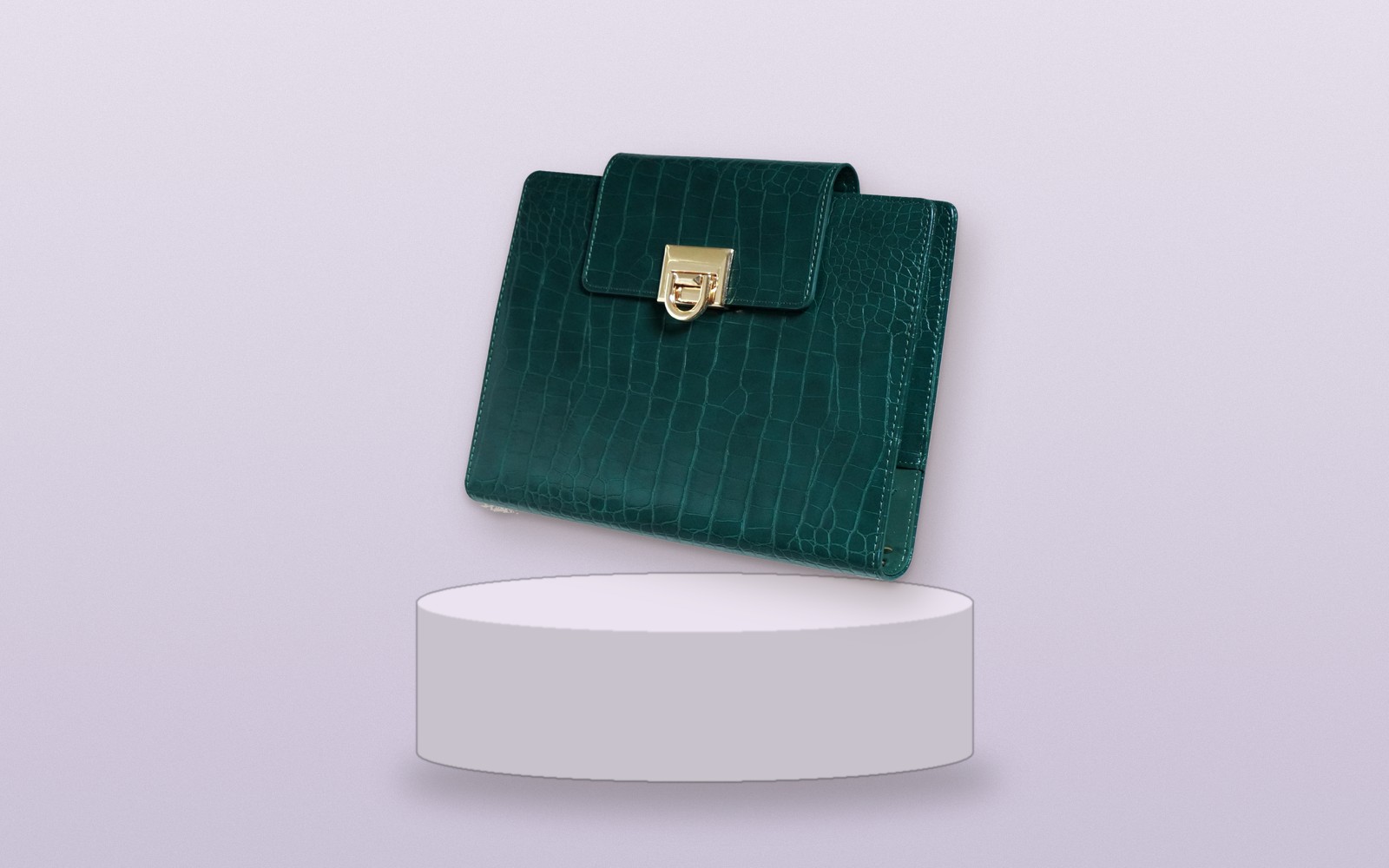 Green EGOSUNNY Croco planner on a lilac pedestal