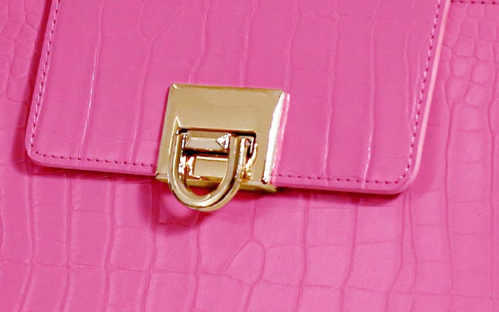 Close-up of the clasp on a pink EGOSUNNY Croco