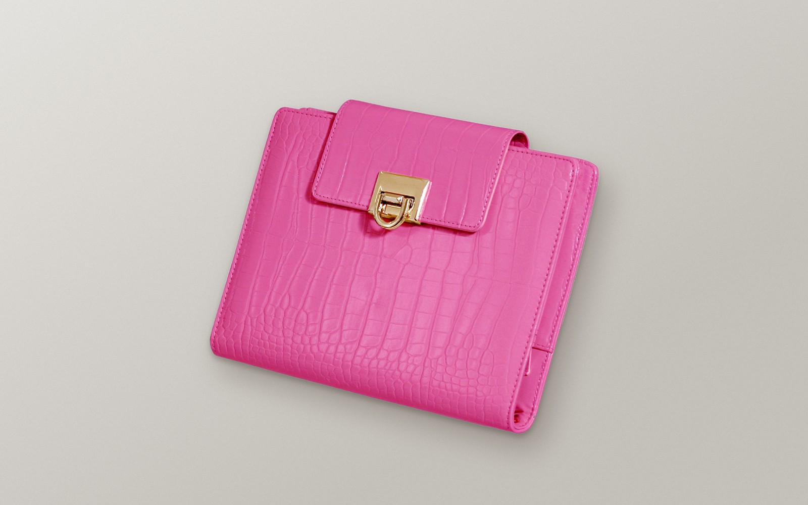 Pink EGOSUNNY Croco planner on a soft background