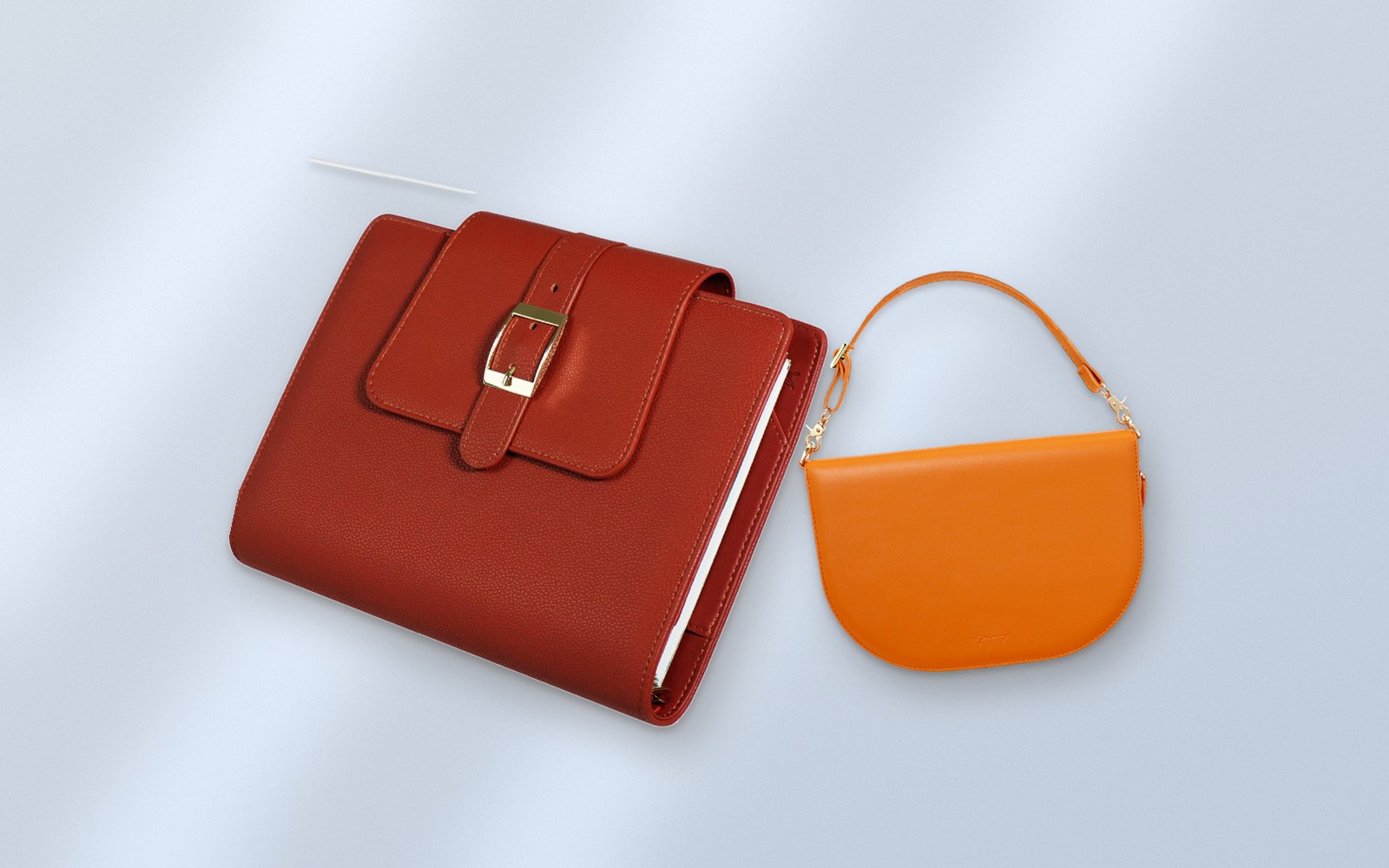 Red EGOSUNNY Belt beside an orange EGOSUNNY Luna