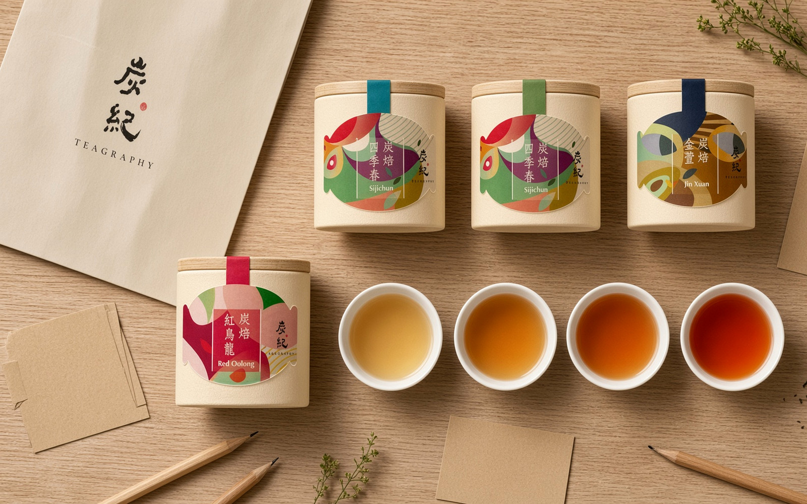 Tasting cups of TEAGRAPHY oolong from pale gold to orange-red with note cards