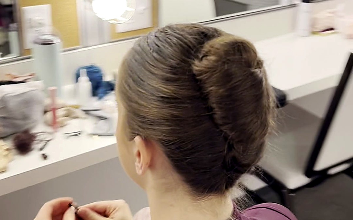 Woman at a desk working through her notes