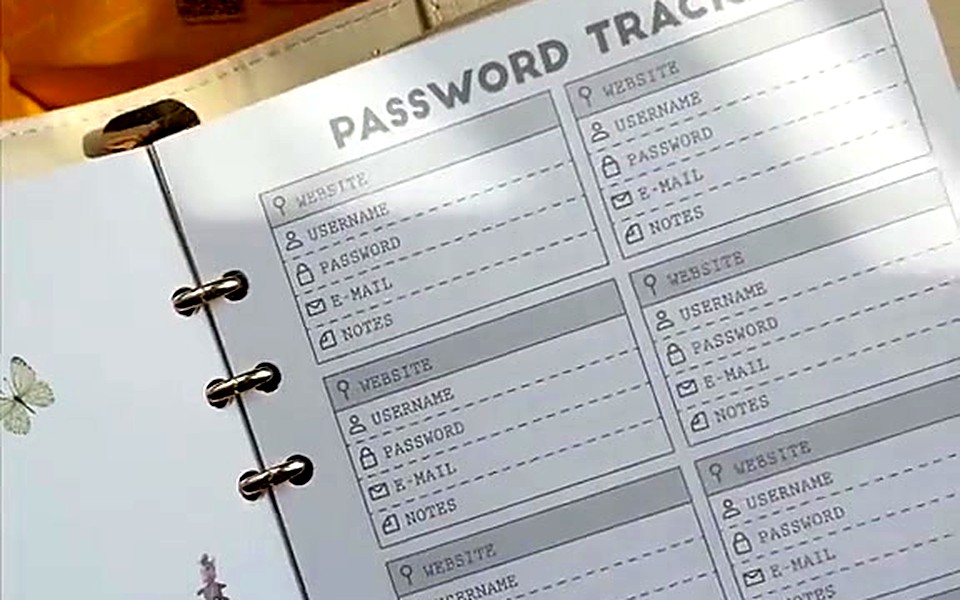 Tracker refill page in an open ring-bound planner