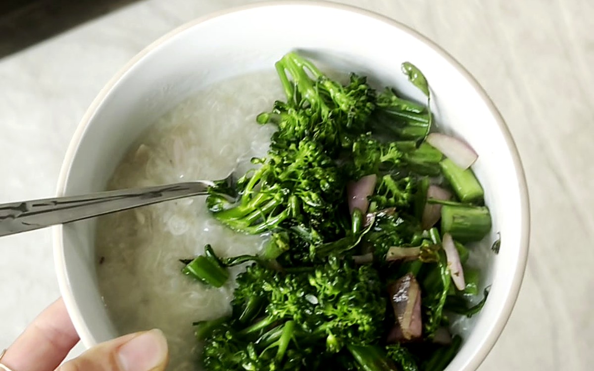 Bowl of fresh greens with a fork